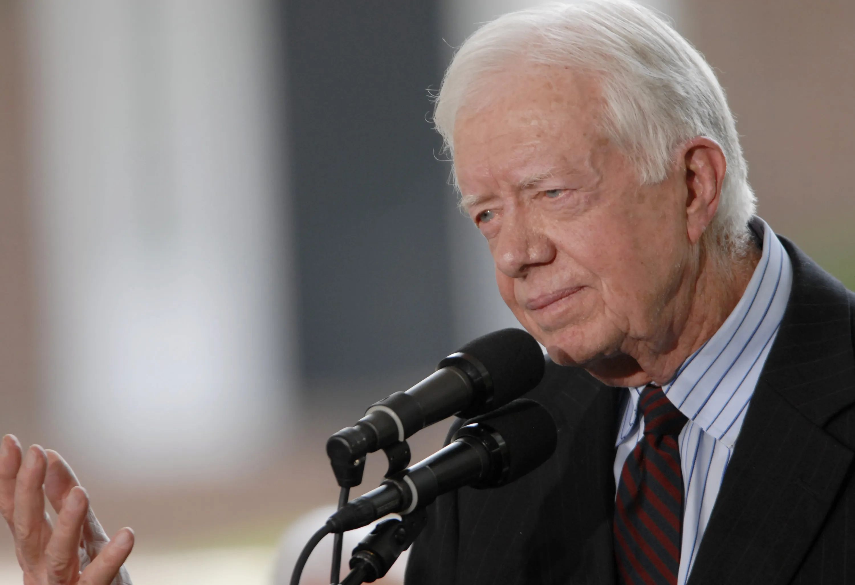 Former U.S. President Jimmy Carter makes a short speech from the stage during the Billy Graham Library Dedication Service on May 31, 2007, in Charlotte, North Carolina.?w=200&h=150