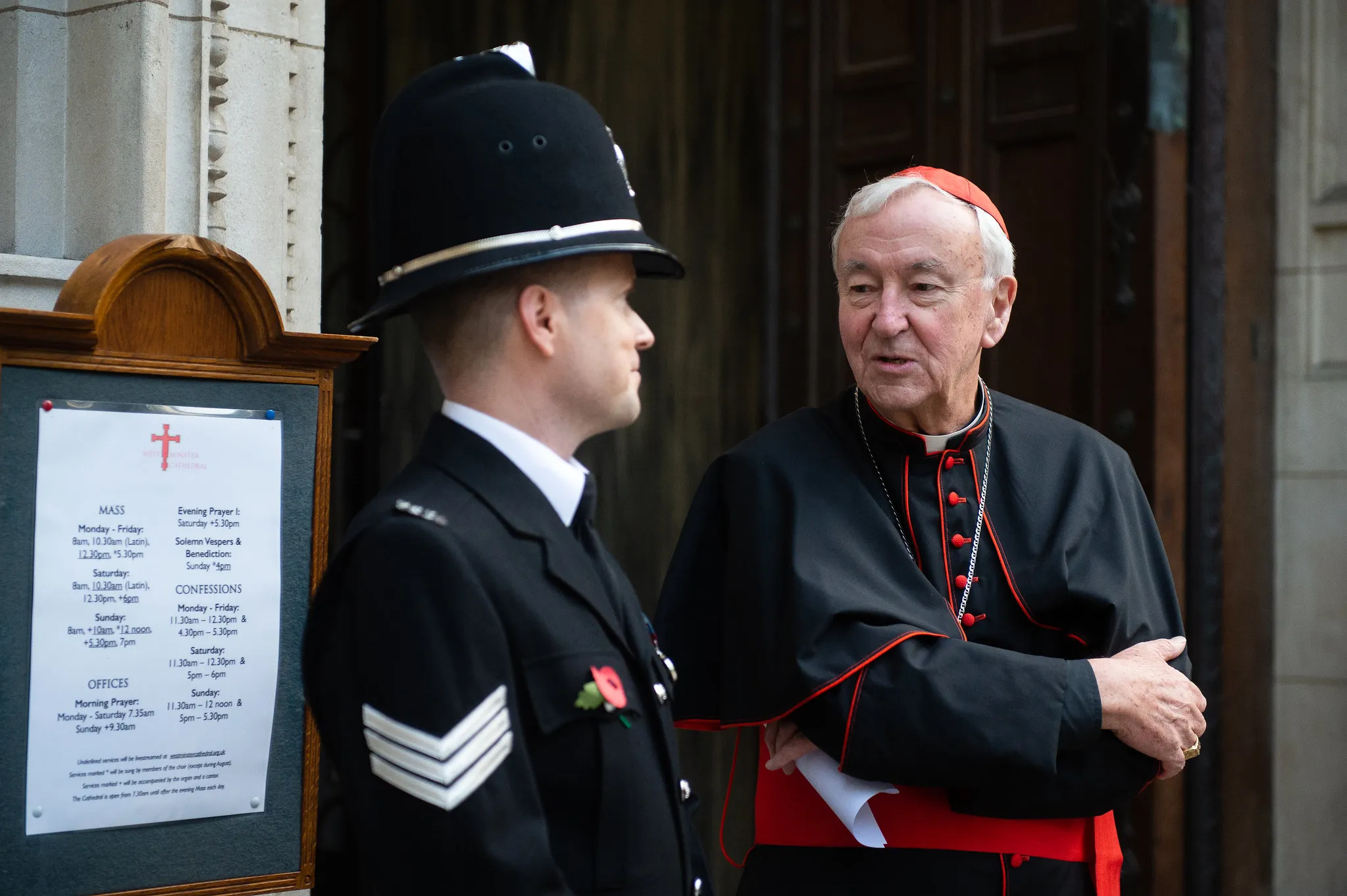 Cardinal Vincent Nichols of Westminster speaks with a police officer outside Westminster Cathedral in London, Nov. 9, 2021.?w=200&h=150