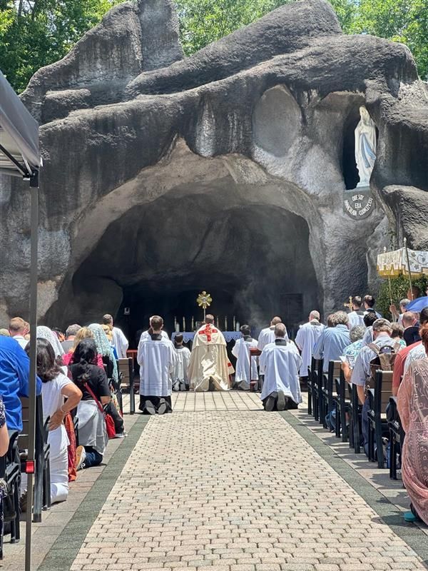 The faithful adore Christ in the Eucharist at the Marian grotto at the Shrine of the Most Blessed Sacrament in Hanceville, Alabama, at a stop on the National Eucharistic Pilgrimage on June 20, 2024. Credit: EWTN