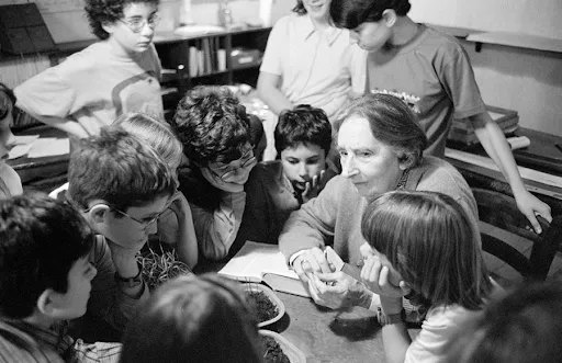 Sofia Cavalletti with young Catechesis of the Good Shepherd students. Credit: Courtesy of CGS archives