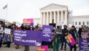 Opponents of transgender treatments on children gather in front of the U.S. Supreme Court building in Washington, D.C., on Dec. 4, 2024, as justices hear oral arguments for a challenge to a Tennessee law banning transgender surgeries and hormones for minors.