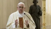 Pope Francis celebrates Mass in the chapel of the Casa Santa Marta on May 1, 2020, the feast of St. Joseph the Worker.