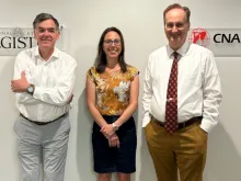 National Catholic Register Editor-in-Chief Shannon Mullen (left) and Catholic News Agency Editor-in-Chief Ken Oliver (right) flank Jeanette DeMelo (center), the executive director of the two EWTN News properties.