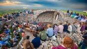 University of Mary students gather to celebrate the Blessed Mother’s birthday at the school’s grotto.