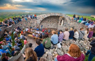 University of Mary students gather to celebrate the Blessed Mother’s birthday at the school’s grotto. Credit: Mike McCleary/University of Mary