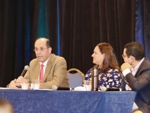 Alejandro Aguilera-Titus (at left), lead staff for Hispanic/Latino Ministry at the United States Conference of Catholic Bishops, speaks during the 2024 Conference of the National Catholic Association of Diocesan Directors for Hispanic Ministry, which took place from Oct. 8–11. Next to him is Lorianne Aubut of the Diocese of Madison, Wisconsin, and Edwin Ferrera of the Archdiocese of Seattle.