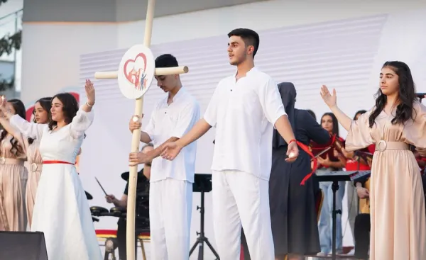 Young people perform at the seventh annual Ankawa Youth Gathering held Aug. 22–24, 2024, in in Ankawa-Erbil, Iraq. The event was sponsored by the Chaldean Archdiocese of Erbil and its theme, "Joy of Love," was inspired by Pope Francis' apostolic exhortation on love within the family. Credit: Photo courtesy of Ankawa Youth Gathering 2024 Facebook page