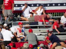 Trump supporters are seen covered with blood in the stands in aftermath of assassination attempt against former President Donald Trump in Butler, Pennsylvania, July 13, 2024.