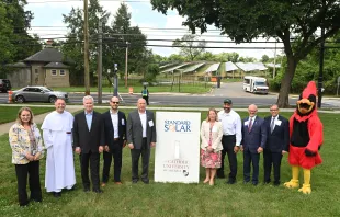 The Catholic University of America President Peter Kilpatrick (next to mascot) with Standard Solar, university, and government leaders on June 3, 2024. Credit: Courtesy of the Catholic University of America