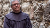 Father Francesco Patton, custos of the Holy Land, stops at the Eighth Station of the Via Dolorosa in Jerusalem during the Good Friday Via Crucis on March 29, 2024.