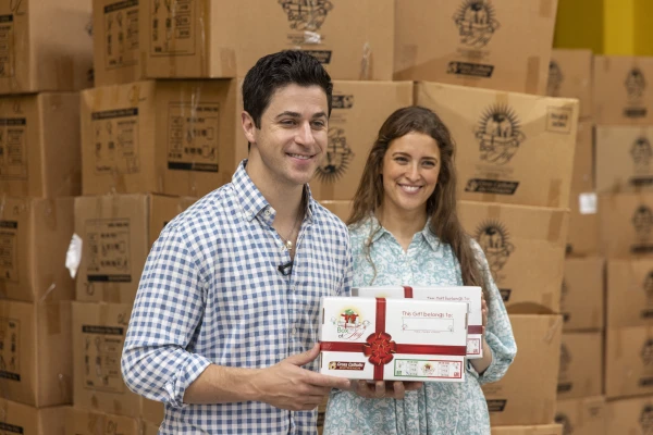 Catholic actor David Henrie and his wife, Maria, hand out Box of Joy gifts to children in Guatemala. Credit: Benjamin Rusnak