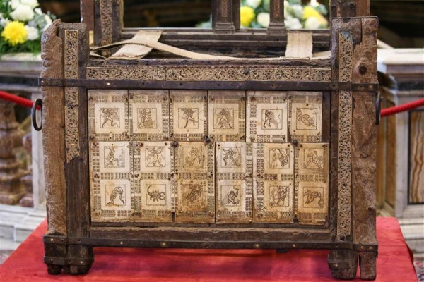 Closer details can be seen of the historic relic of the Chair of St. Peter. For the first time in over a century, the wooden throne symbolizing the pope’s magisterial authority has been removed from its gilded bronze reliquary in St. Peter’s Basilica to be displayed for public veneration. Credit: Daniel Ibanez