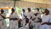 Members of St. Monica Widows Group pray during Mass at St. Aloysius Gonzaga Ojolla Parish in the Archdiocese of Kisumu in Kenya.