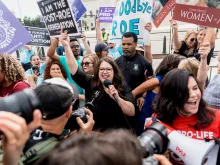 Kristan Hawkins, president of Students for Life of America, celebrates outside of the Supreme Court after the overturn of Roe v. Wade on June 24, 2022.