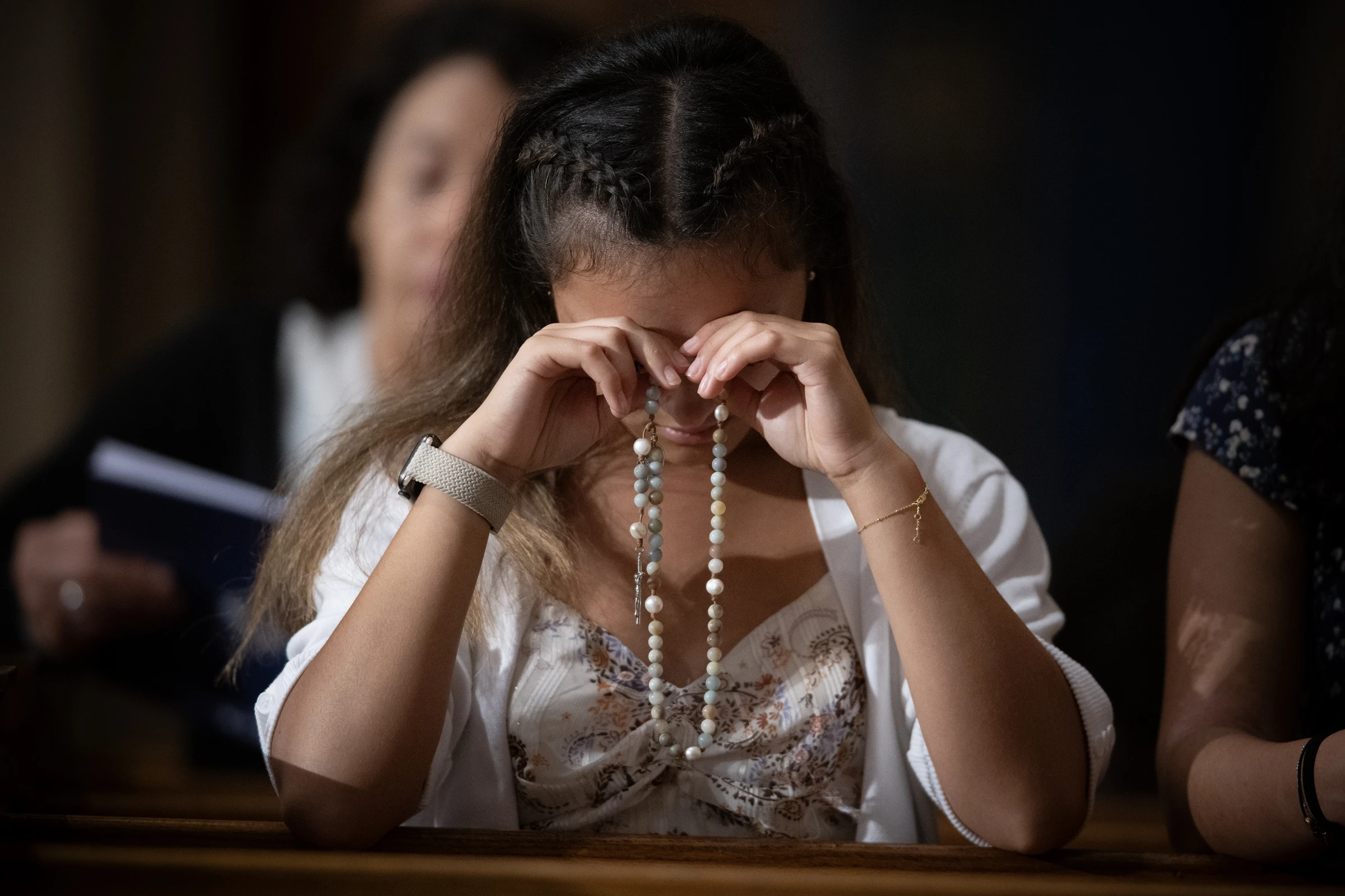 A woman prays the rosary at the Dominican Rosary Pilgrimage at the National Shrine of the Immaculate Conception in Washington, DC, on Sept. 28, 2024.?w=200&h=150