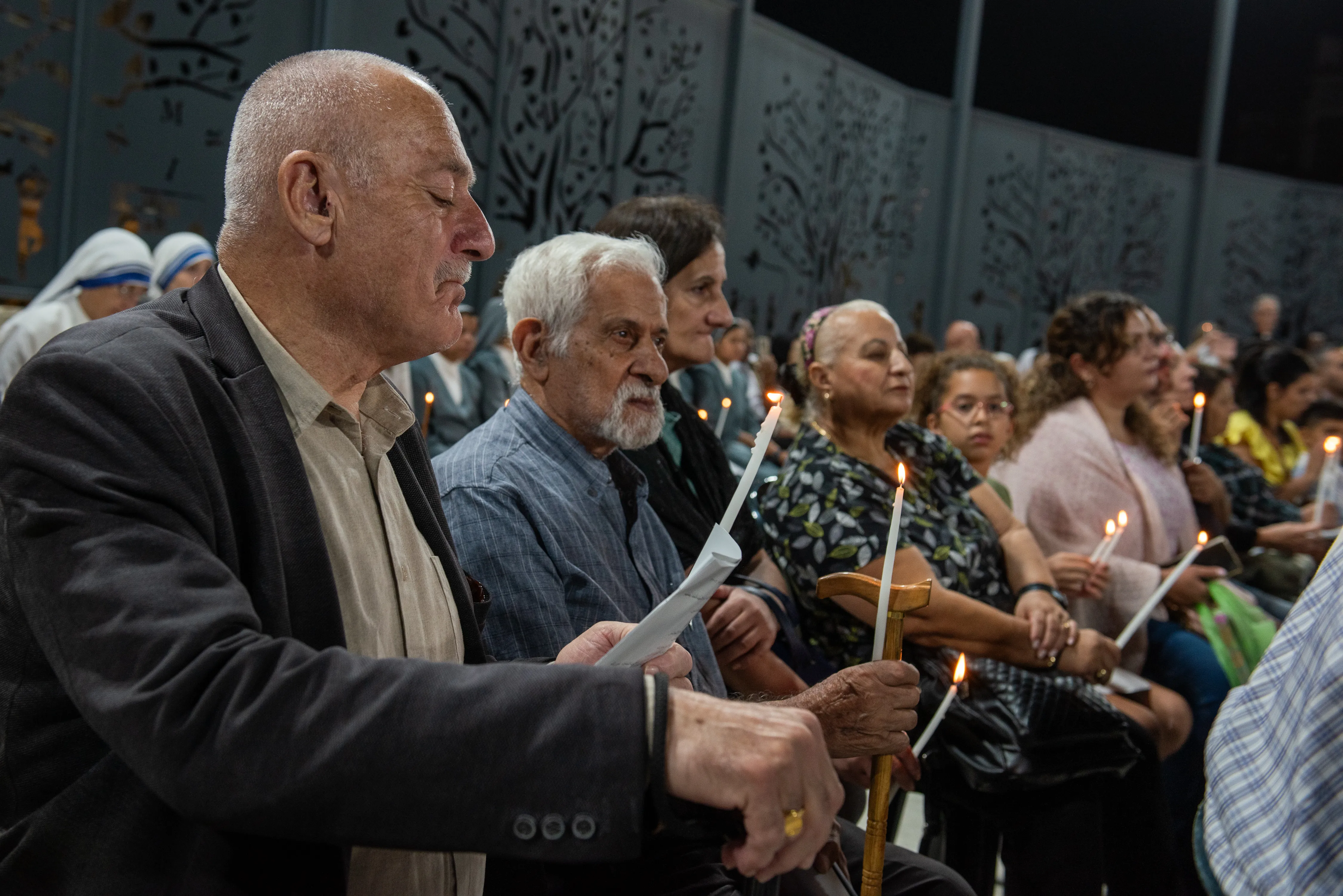 PHOTOS: Catholics gather in Jerusalem for a prayer vigil for peace