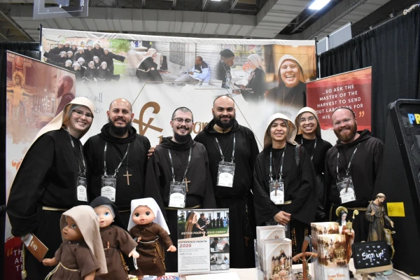 Members of the Fraternity Poor of Jesus Christ, a group based in Brazil, pose at their booth at Mission Way at SEEK25 in Salt Lake City, Jan. 3, 2025. Credit: Kate Quiñones/CNA