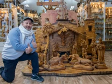 Bassem Giacaman in his shop in Bethlehem in December 2024. The artisans in Bethlehem are almost all Christians. They primarily work with olive wood. Most of the businesses in Bethlehem are family businesses.