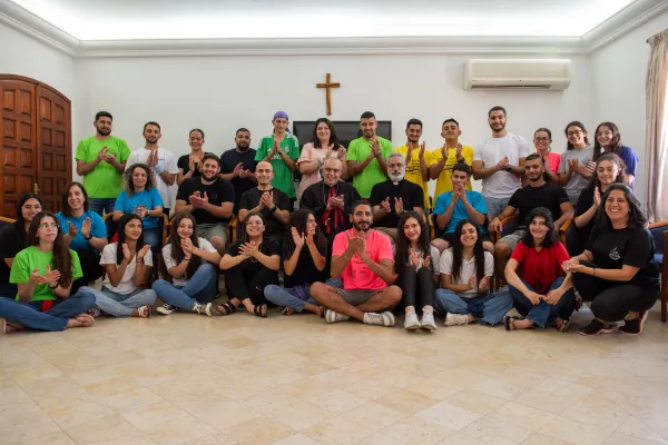 A group of young people from the Apostolic Movement of Jish, an Israeli Arab village located at the foot of Mount Meron, a few miles from the Lebanese border. In the center is Monsignor Moussa El-Hage, Maronite archbishop of Haifa and the Holy Land. To his right is Father Sandy Habib, the Maronite parish priest of Jish. July 2024. Credit: Marinella Bandini