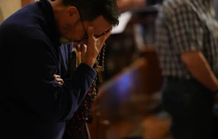 A man prays the rosary during a daylong event on Sept. 30, 2023, in Washington, D.C., focused on praying and reflecting on the rosary to conclude a nine-month rosary novena. Credit: George Goss