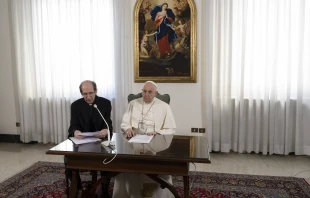 Papal aide Monsignor Paolo Braida reads Pope Francis' prepared remarks for the Sunday Angelus on Dec. 3, 2023, from the chapel at the papal residence at Casa Santa Marta. Vatican Media