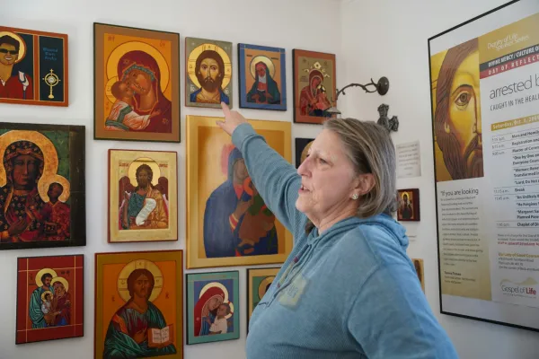 Kathleen Crombie keeps replicants of all the icons that have been commissioned by others in her home studio. Whenever someone commissions an icon, she prays about whether or not God wills her to write the icon. Credit: Daniel Meloy/Detroit Catholic