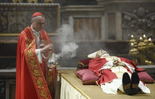 Cardinal Mauro Gambetti, the archpriest of St. Peter’s Basilica, presided over a brief ritual upon the arrival of Benedict XVI’s body in St. Peter's Basilica on Jan. 2, 2023, sprinkling the body with holy water and offering prayers for the repose of his soul. Vatican Media