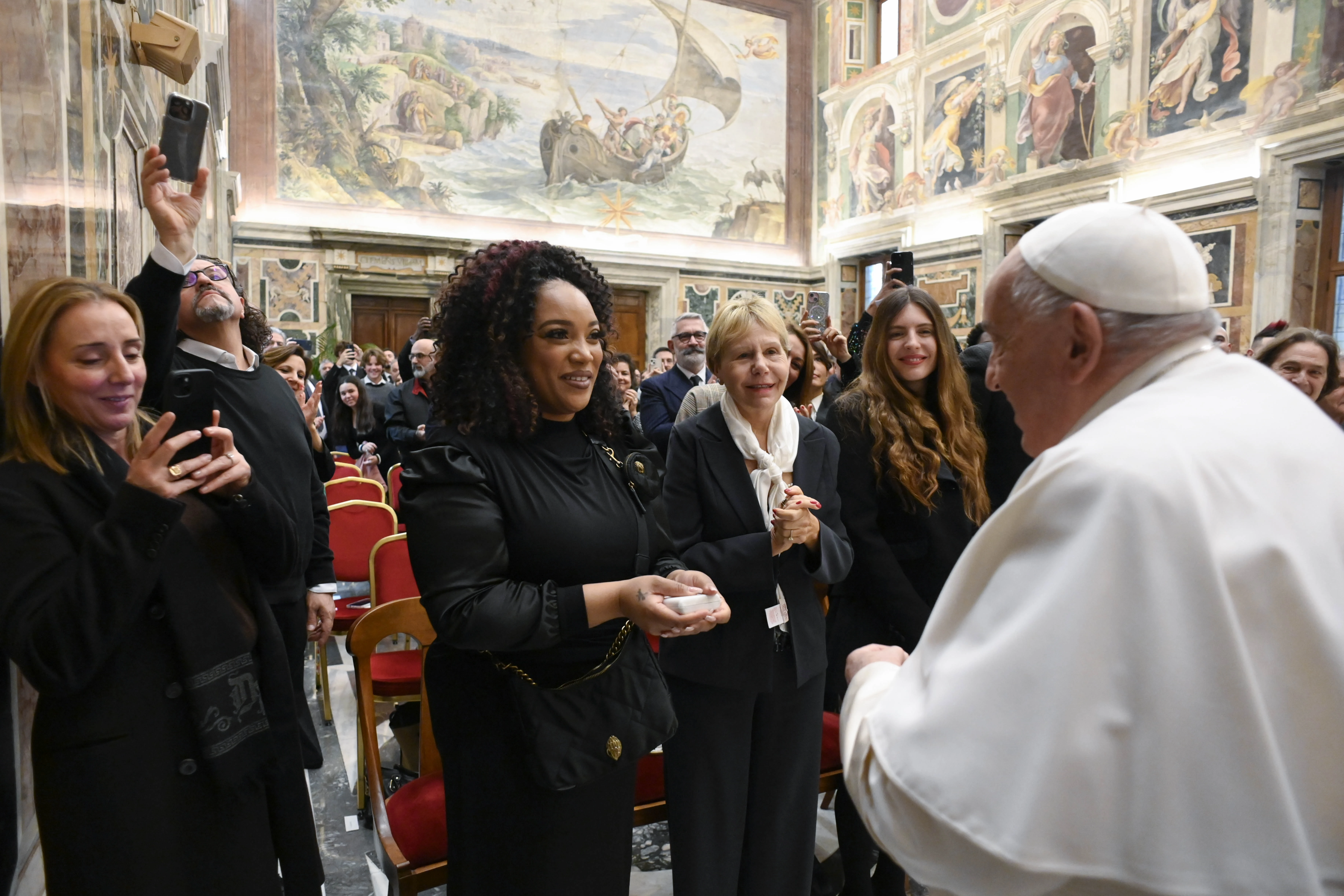 Pope Francis greets artists and participants of the 2024 Vatican Christmas Concert in the Clementine Hall on Dec. 14, 2024.?w=200&h=150