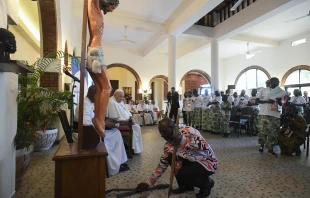 Young people from eastern Congo lay down the machetes and knives used to kill their families at the foot of Christ’s cross to symbolize their forgiveness in a moving encounter with Pope Francis during his trip to the country Feb. 1, 2023. Vatican Media