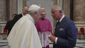 Pope Francis greets His Royal Highness Prince Charles of Wales at the canonization of St. John Henry Newman at the Vatican on Oct. 13, 2019.