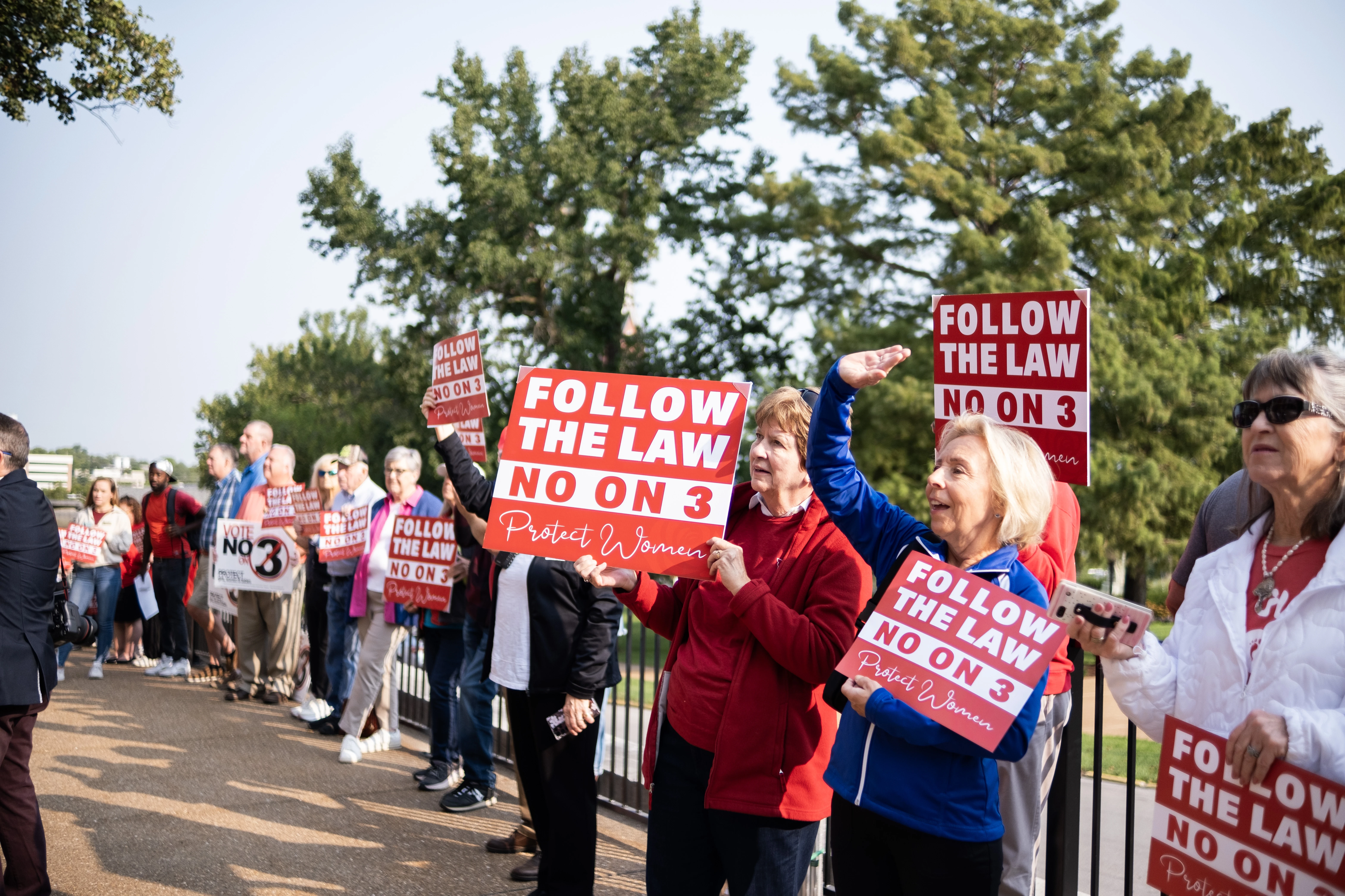 Pro-life protestors hold signs outside the Missouri Supreme Court on Sept. 10, 2024, advocating against Amendment 3, which would dramatically expand abortion access in Missouri if passed in November.?w=200&h=150