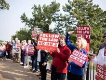 Pro-life protestors hold signs outside the Missouri Supreme Court on Sept. 10, 2024 advocating against Amendment 3, which would dramatically expand abortion access in Missouri if passed in November.