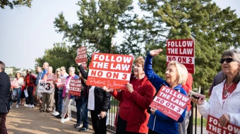 Pro-life protestors hold signs outside the Missouri Supreme Court on Sept. 10, 2024, advocating against Amendment 3, which would dramatically expand abortion access in Missouri if passed in November.