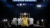 Bishop Andrew Cozzens of Crookston, Minnesota, who spearheaded the U.S. bishops’ initiative of Eucharistic Revival, adores Christ in the Eucharist with tens of thousands of people in Lucas Oil Stadium on July 17, 2024.