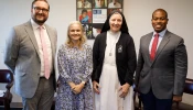 Andrew Kubrick, Religious Freedom Institute; Dr. Kathleen Berchelmann, My Catholic Doctor; Sister Deirdre Byrne; and Louis Brown, Christ Medicus Foundation, speak on the issue of religious freedom protections for Catholic health care workers on Oct. 24, 2024.