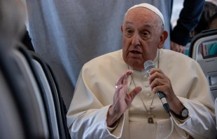 Pope Francis speaks aboard the papal plane on Sunday, Sept. 29, 2024. Credit: Daniel Ibáñez/CNA