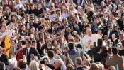 Pope Francis greets pilgrims at his general audience in St. Peter's Square on Wednesday, Sept. 18, 2024.