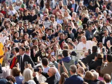 Pope Francis greets pilgrims at his general audience in St. Peter's Square on Wednesday, Sept. 18, 2024.