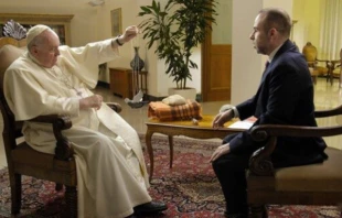 Pope Francis speaks with journalist Fabio Marchese Ragona. Credit: Vatican Media