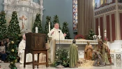 From left to right: Auxiliary Bishop of the Our Lady of the Angels Pastoral Region Matthew G. Elshoff, St. Monica pastor Father Lloyd Torgerson, and Corpus Christi pastor Monsignor Liam Kidney celebrate Mass at St. Monica Church with Corpus Christi’s surviving tabernacle next to the altar on Jan. 12, 2025.