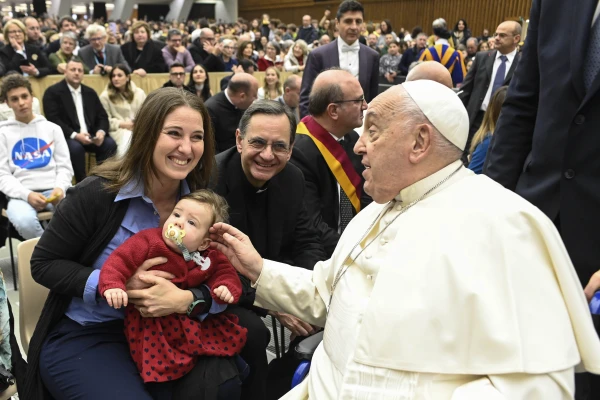 Pope Francis blesses a baby during the Saturday jubilee audience in the Vatican’s audience hall, Jan. 11, 2025. Credit: Vatican Media