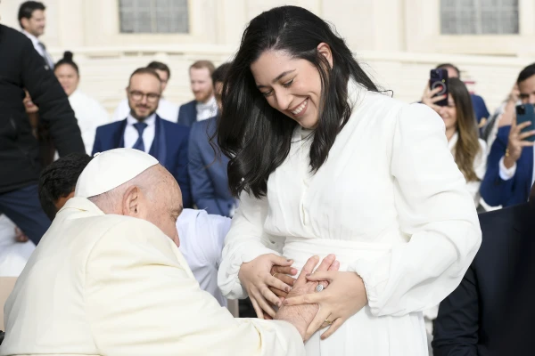 The pope blesses a pilgrim and her unborn baby at the Wednesday general audience in St. Peter's Square at the Vatican on Wednesday, Nov. 13, 2024. Credit: Vatican Media