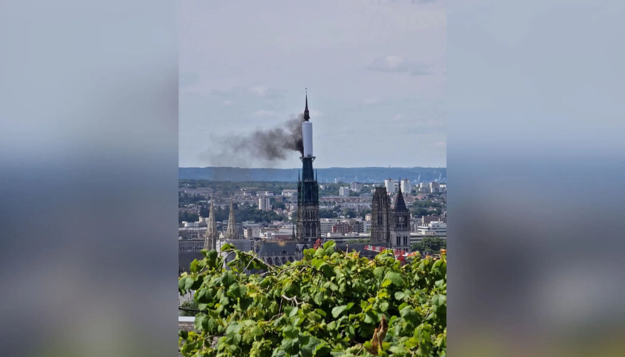 Smoke billows from the spire of Rouen Cathedral in Rouen, northern France, on July 11, 2024.?w=200&h=150