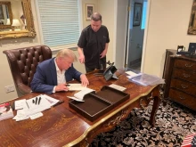 Father Frank Mann is seen with President Donald Trump in an undated photograph.