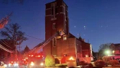 Firefighters work to extinguish the fire at St. Mary Church in Franklin, Massachusetts, Wednesday, Oct. 23, 2024.