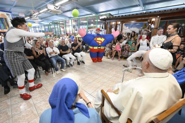 Pope Francis visits with Sister Geneviève Jeanningros and the community of carousel workers and circus performers at the Luna Park on July 31, 2024. Credit: Vatican Media