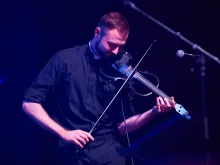 Father Kevin Lenius, a priest from the Diocese of San Angelo, Texas, takes part in the “Concert for Life” playing the electric violin.