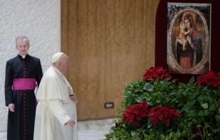 Pope Francis stops to pray before an image of Our Lady and the Child Jesus during his weekly general audience on Jan. 11, 2023. Daniel Ibanez/CNA