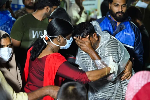 Relatives react at a primary health center following a landslide at Meppadi in Kerala's Wayanad district in India on July 30, 2024. Landslides in India triggered by pounding monsoon rains struck tea plantations and killed at least 108 people on July 30, with at least 250 others rescued from mud and debris. Credit: Idrees Mohammed/AFP via Getty Images