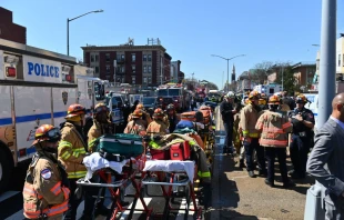 Emergency personnel crowd the streets near a subway station in New York City on April 12, 2022, after at least 16 people were injured during a rush-hour shooting in the Brooklyn borough of New York. Angela Weiss/AFP via Getty Images